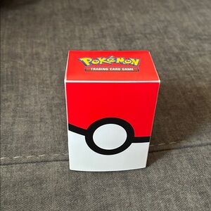 Red and White Pokémon Card Box with cards